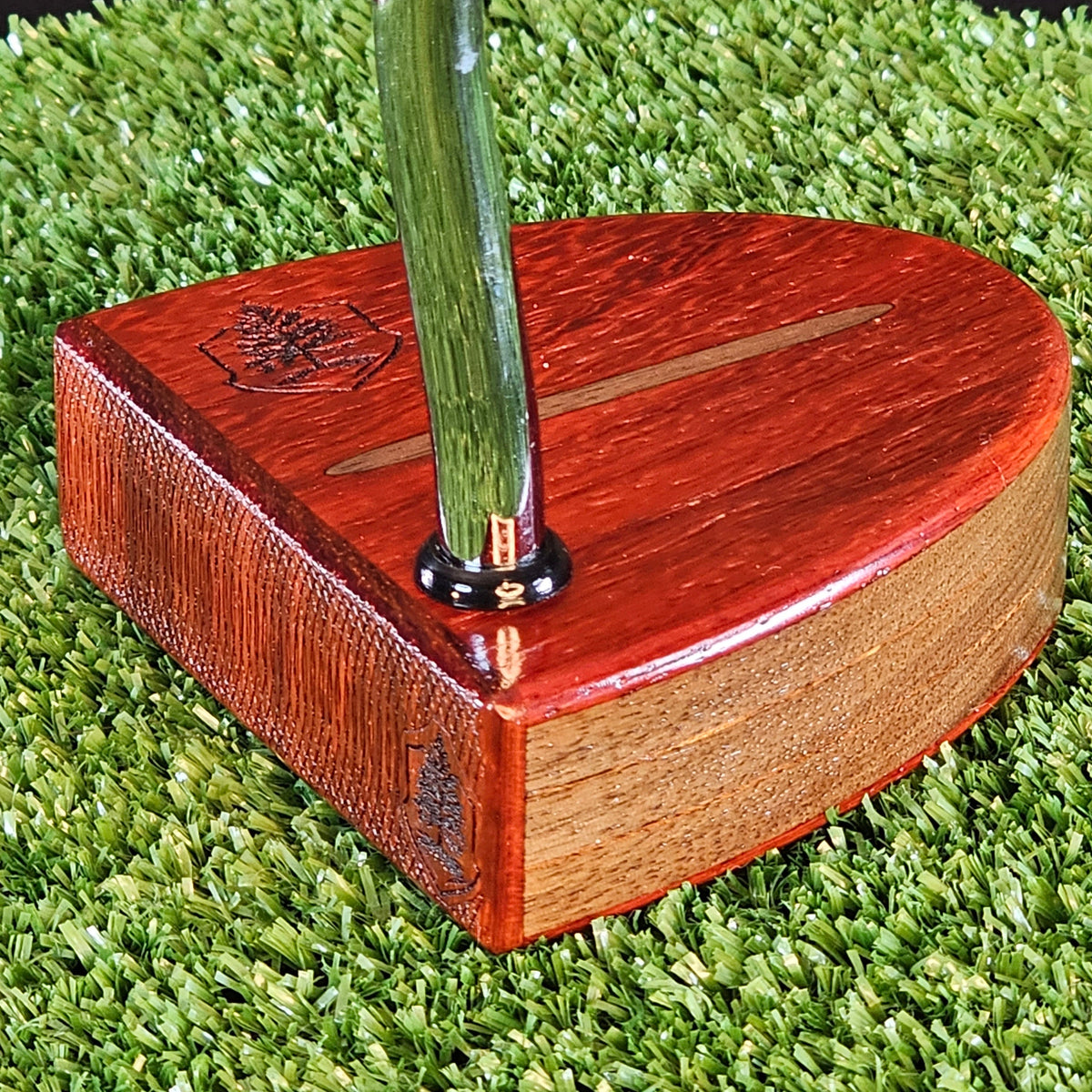 Colored tee markers on a golf tee box