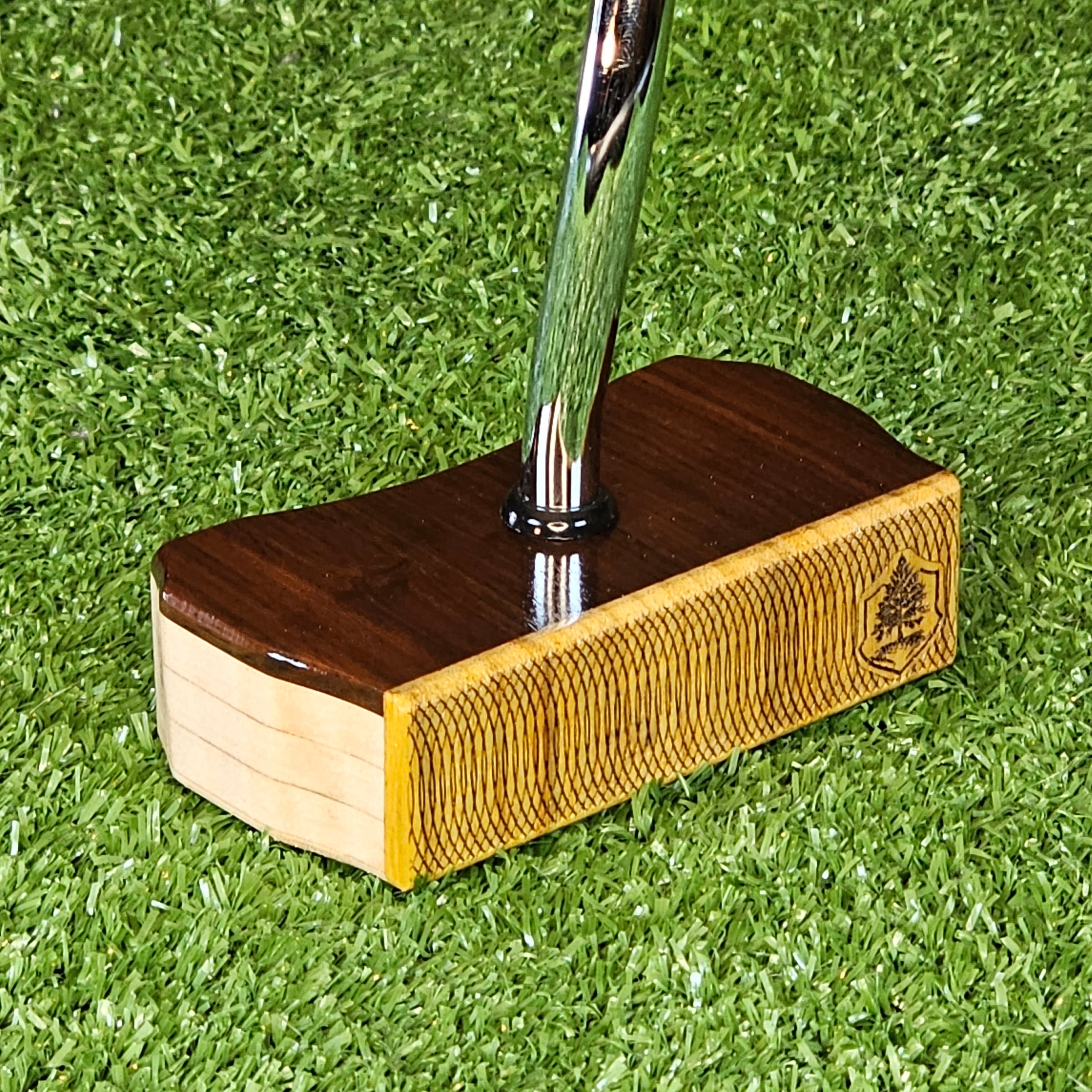 TimberTouch putter behind the ball while reading a green