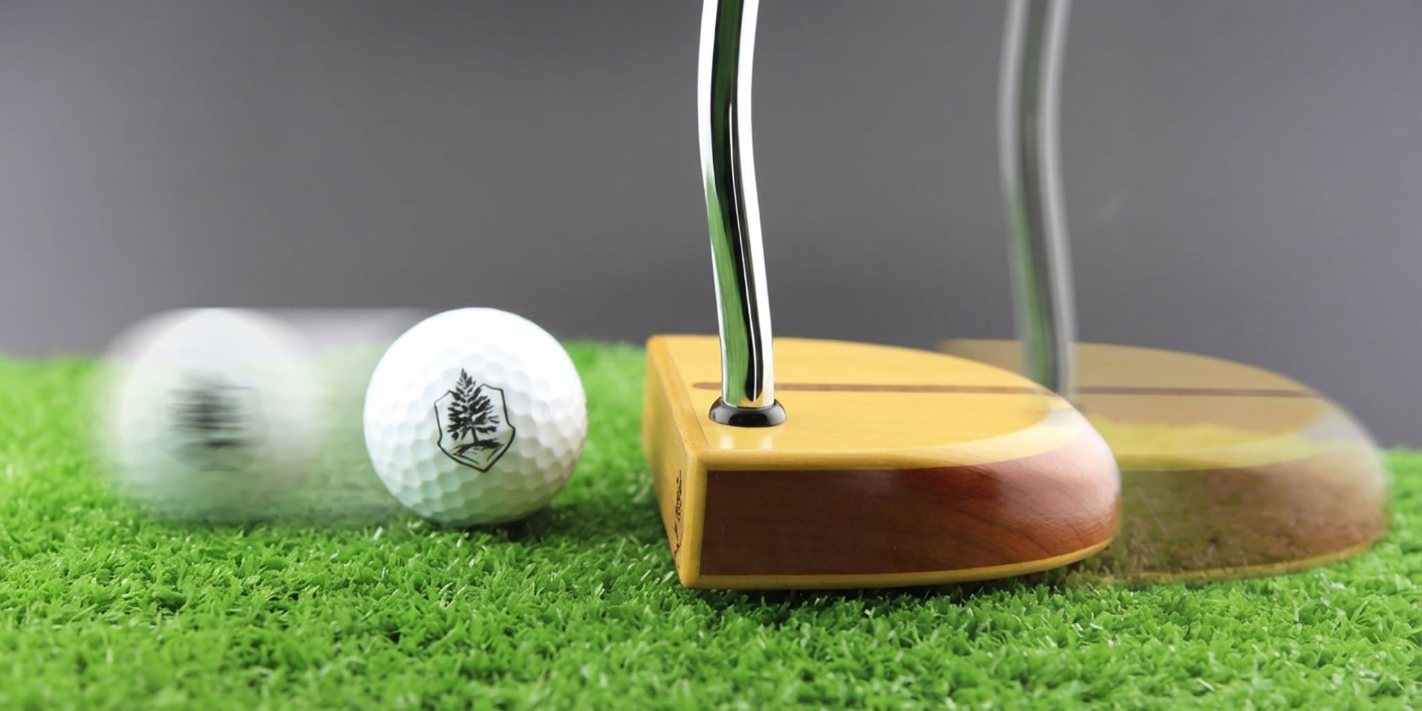 Golf ball in motion showing skid before true roll