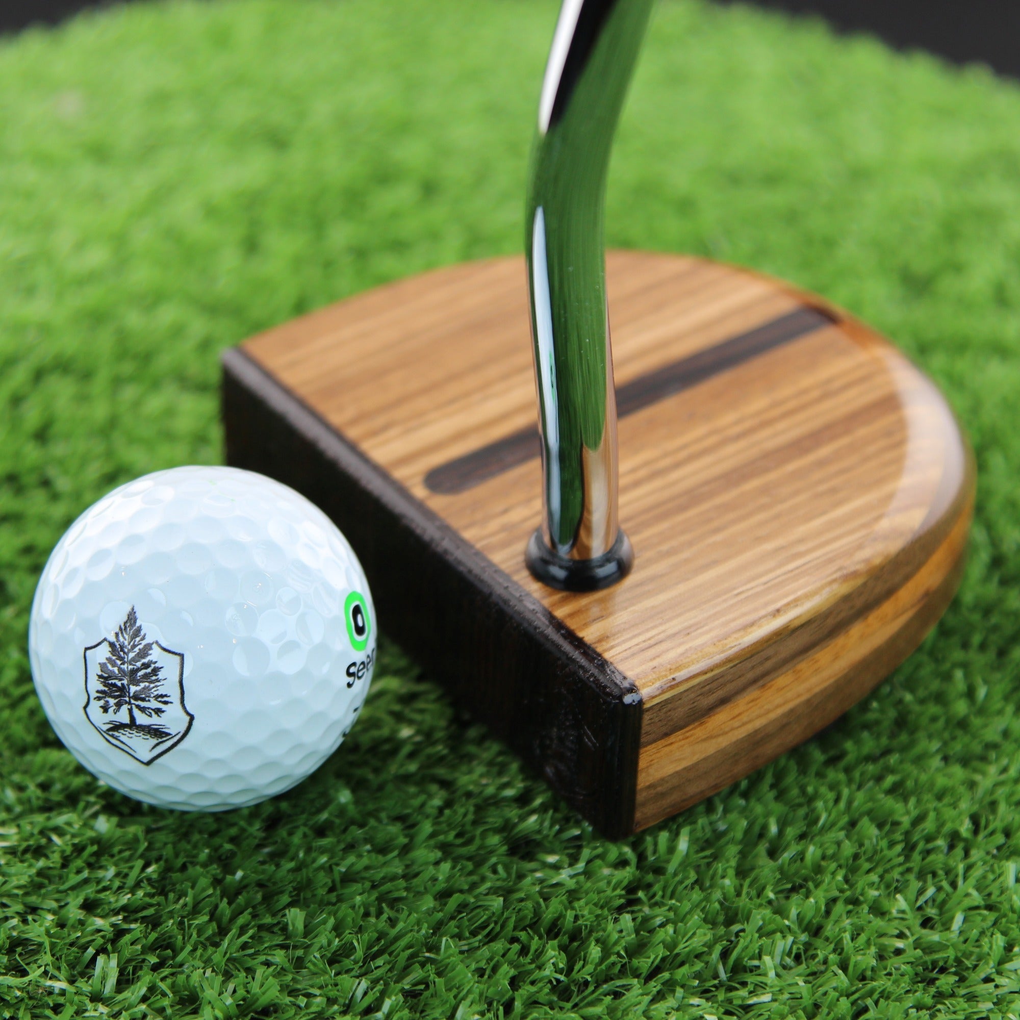 Zebrawood, wenge, rosewood and walnut FATTY mallet putter face view with ball