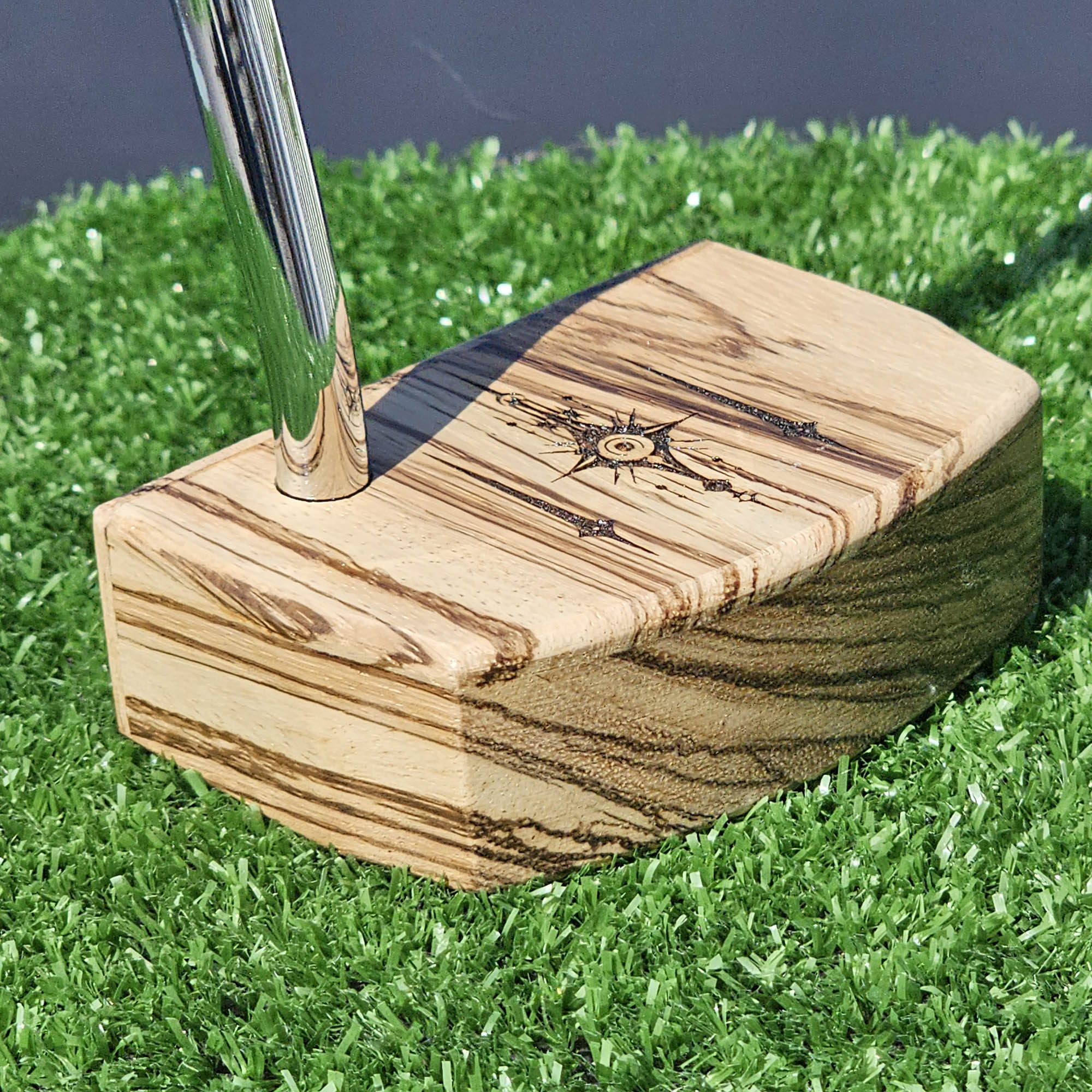 Zebrawood putter with fancy engraved top alignment features