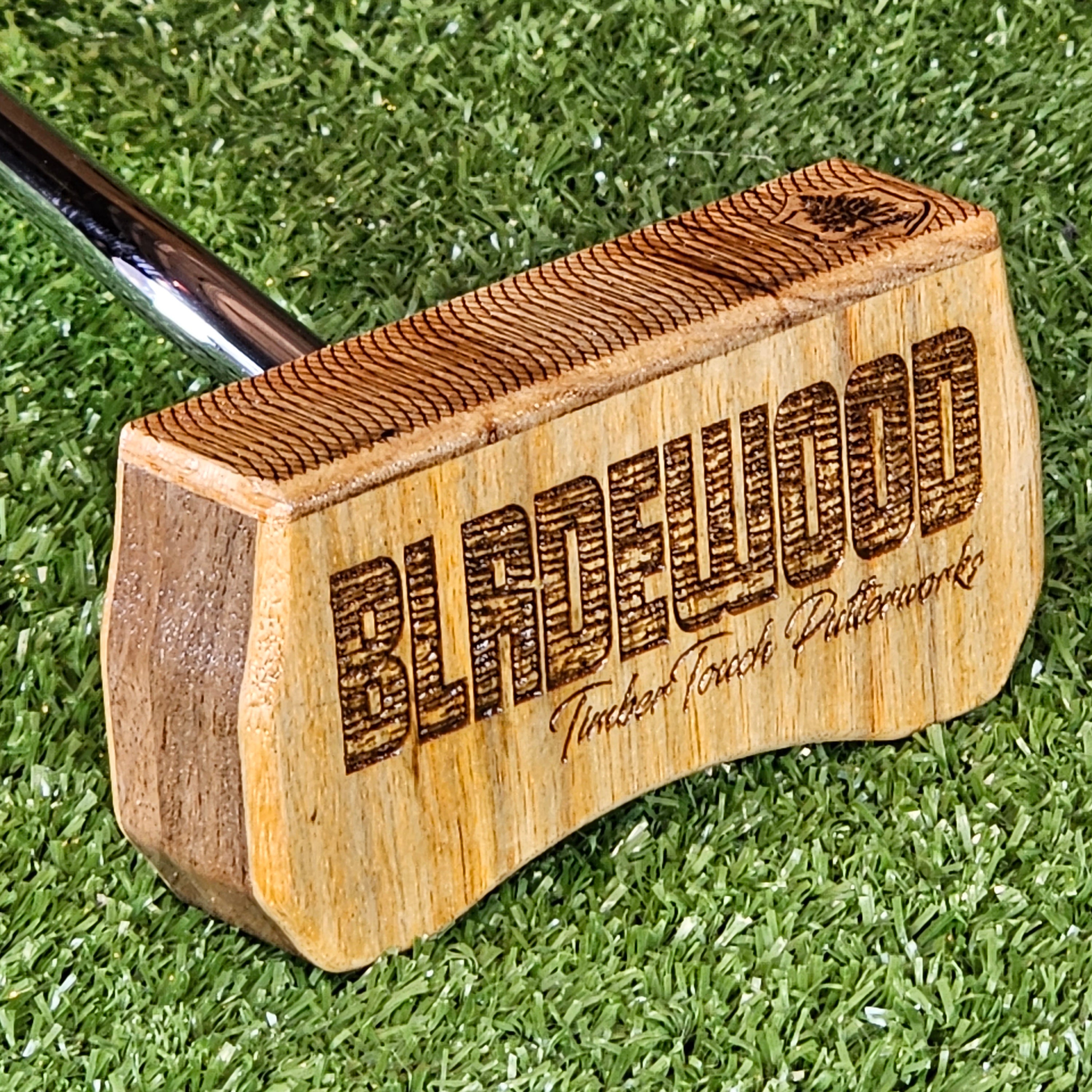 Canarywood and Walnut center shaft Bladewood putter