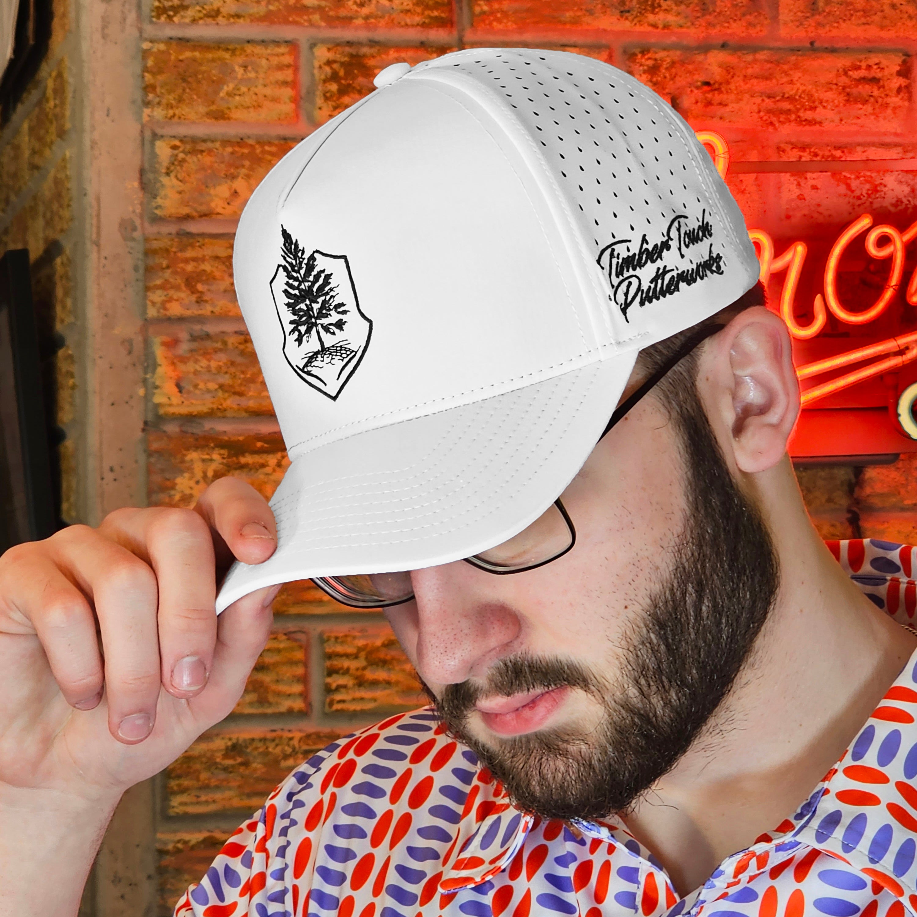 Premium TimberTouch logo white cap with precise black stitching