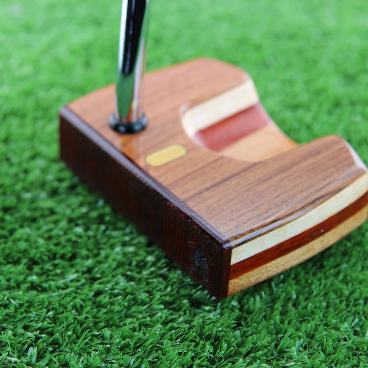 TimberTouch left-handed Woodrich putter in Rosewood, Padauk and Mahogany - face and heel angle view