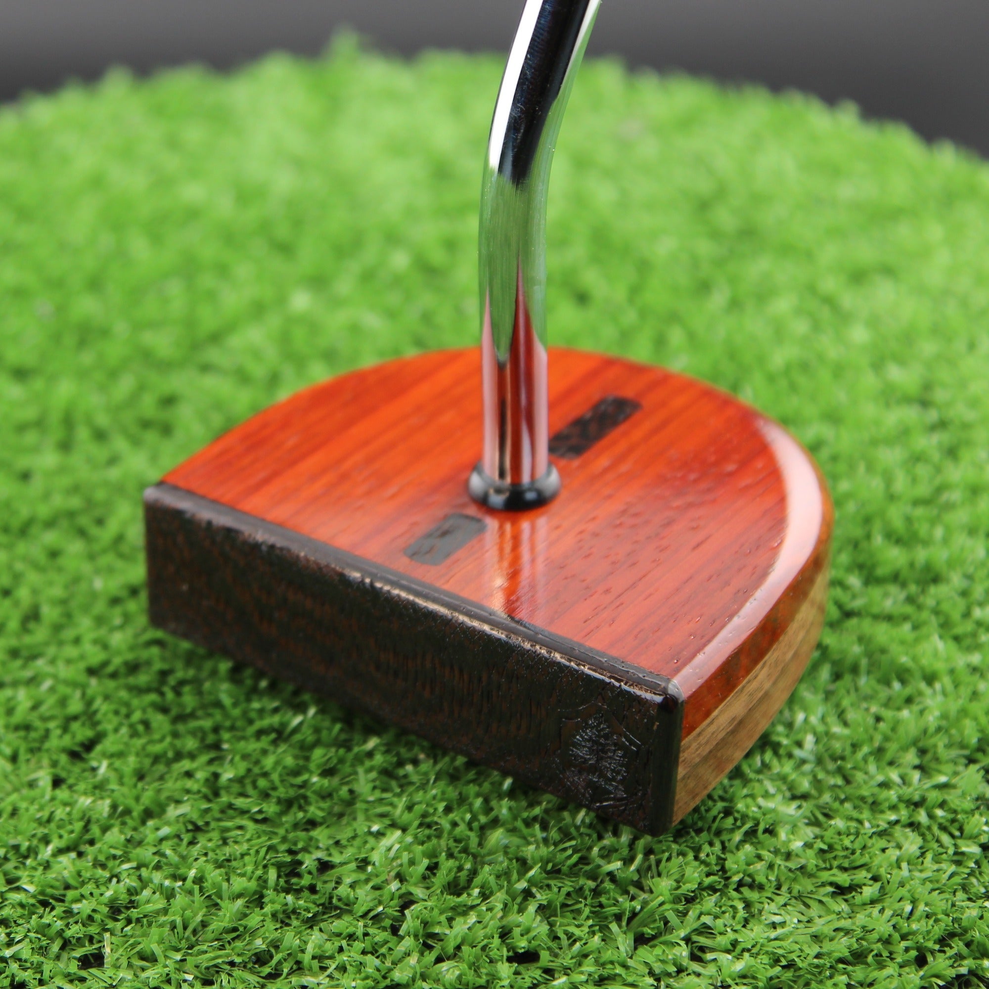 TimberTouch RedHat mallet wood putter with Purpleheart and Padauk center shaft zero torque – face and heel angle view