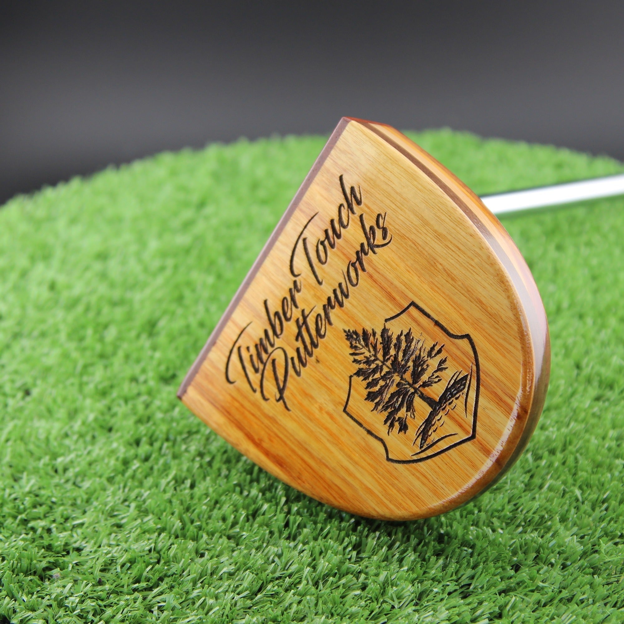 Bubinga and canarywood FATTY mallet putter sole with brand engraving