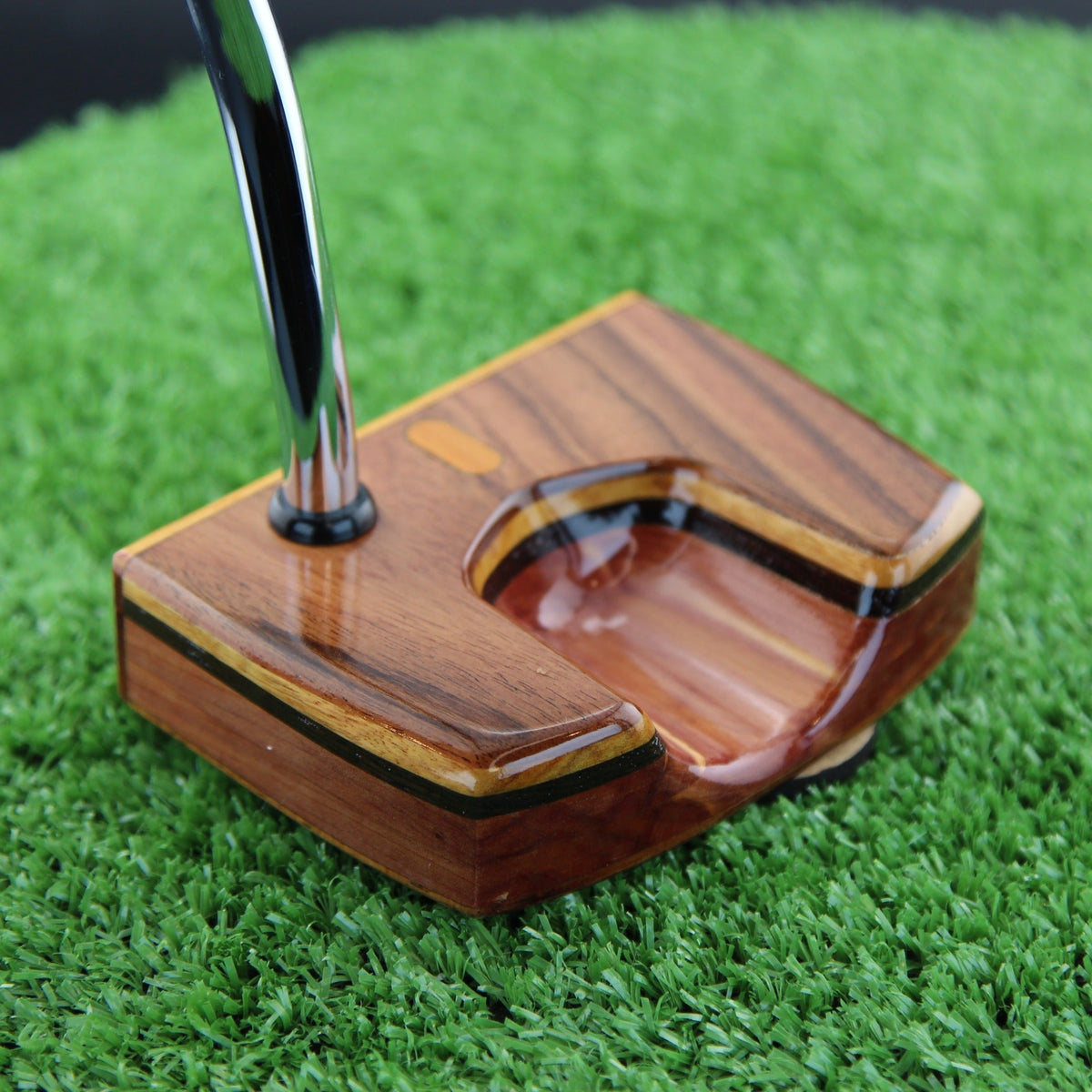 Rosewood, canarywood and cedar Woodrich Regal putter sole and toe angle