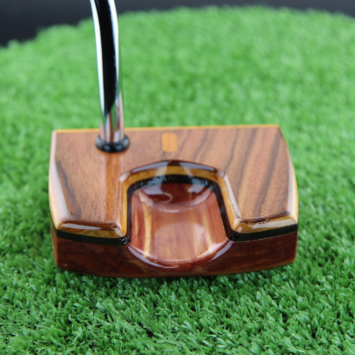 Rosewood, canarywood and cedar Woodrich Regal mallet putter toe view