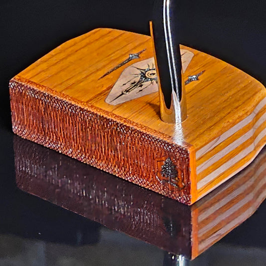 Layered Bloodwood and Red Cedar putter with decorative inlay