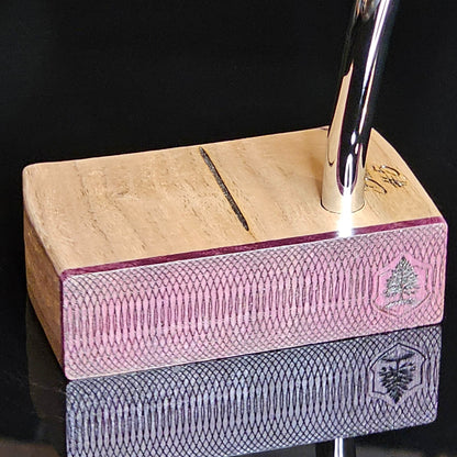 Walnut wood body putter with Purpleheart face.   Clean alignment line top view