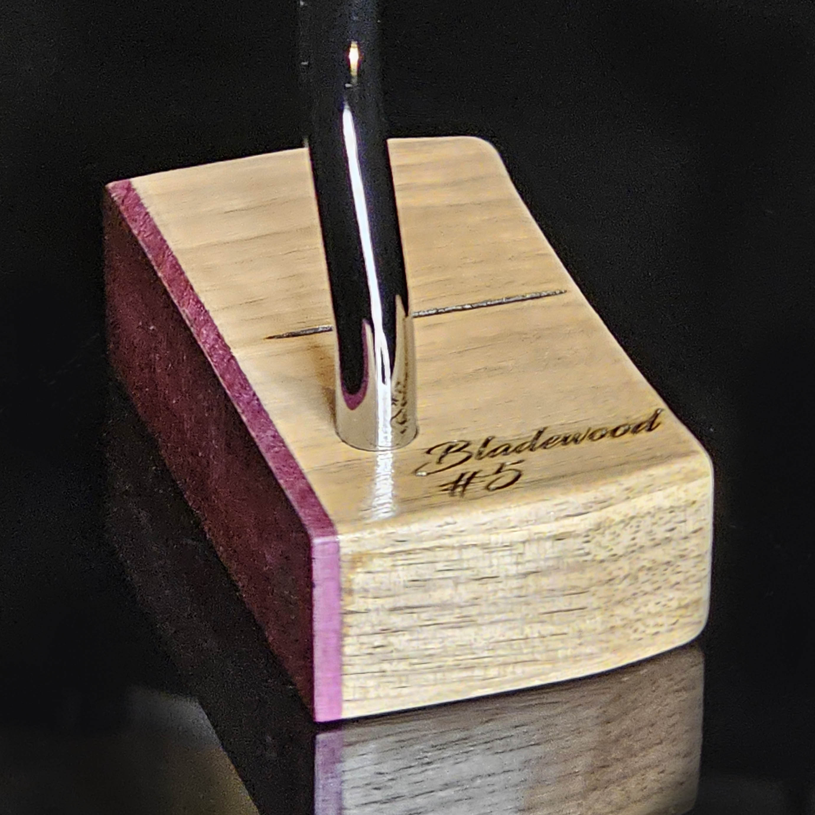 Walnut wood body putter with Purpleheart face.   Clean alignment line top view