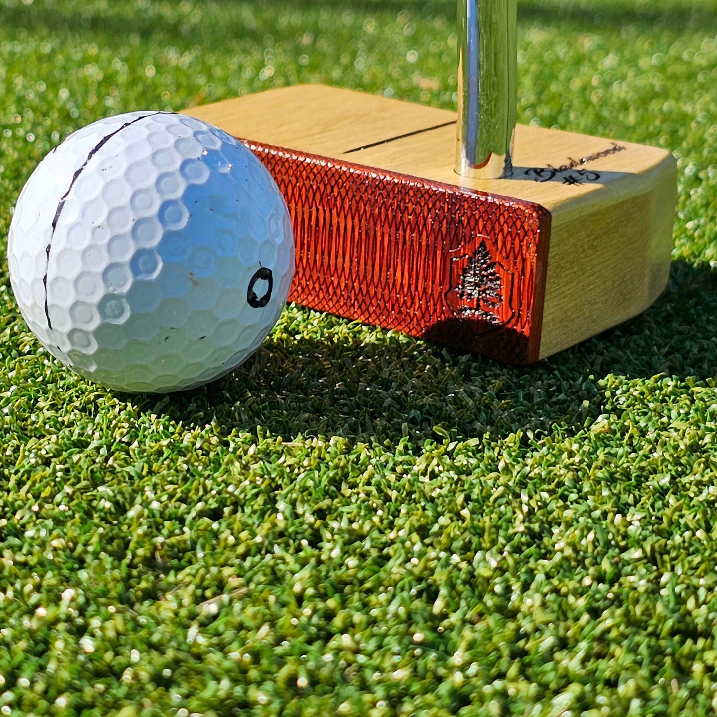 Yellowheart wood body putter with Padauk wood face