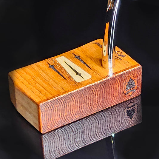 Bloodwood top and faceplate putter with Mahogany body.  Inlay design