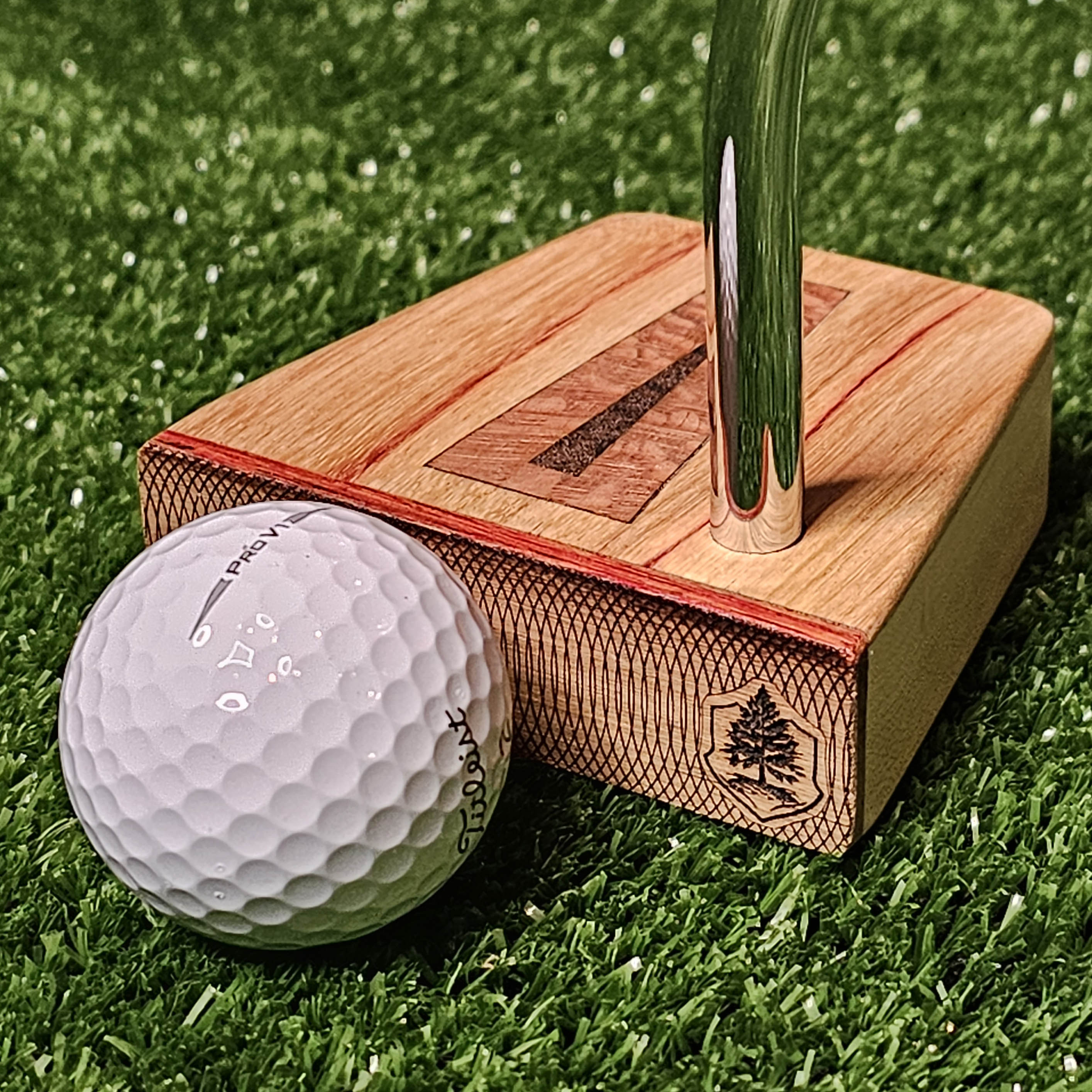 Canarywood top and faceplate putter with hard maple body and lacewood inlay