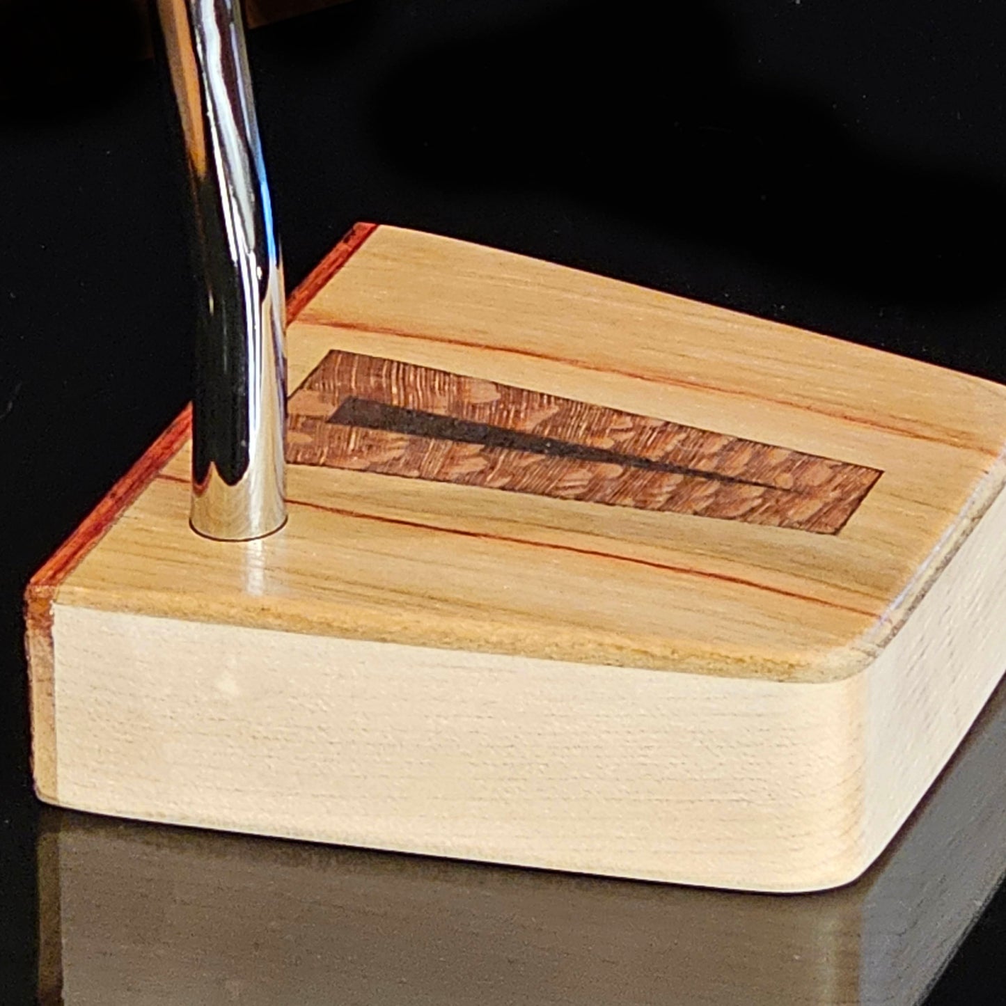 Canarywood top and faceplate putter with hard maple body and lacewood inlay