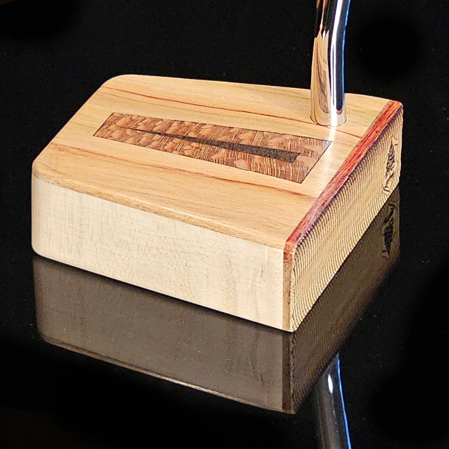 Canarywood top and faceplate putter with hard maple body and lacewood inlay