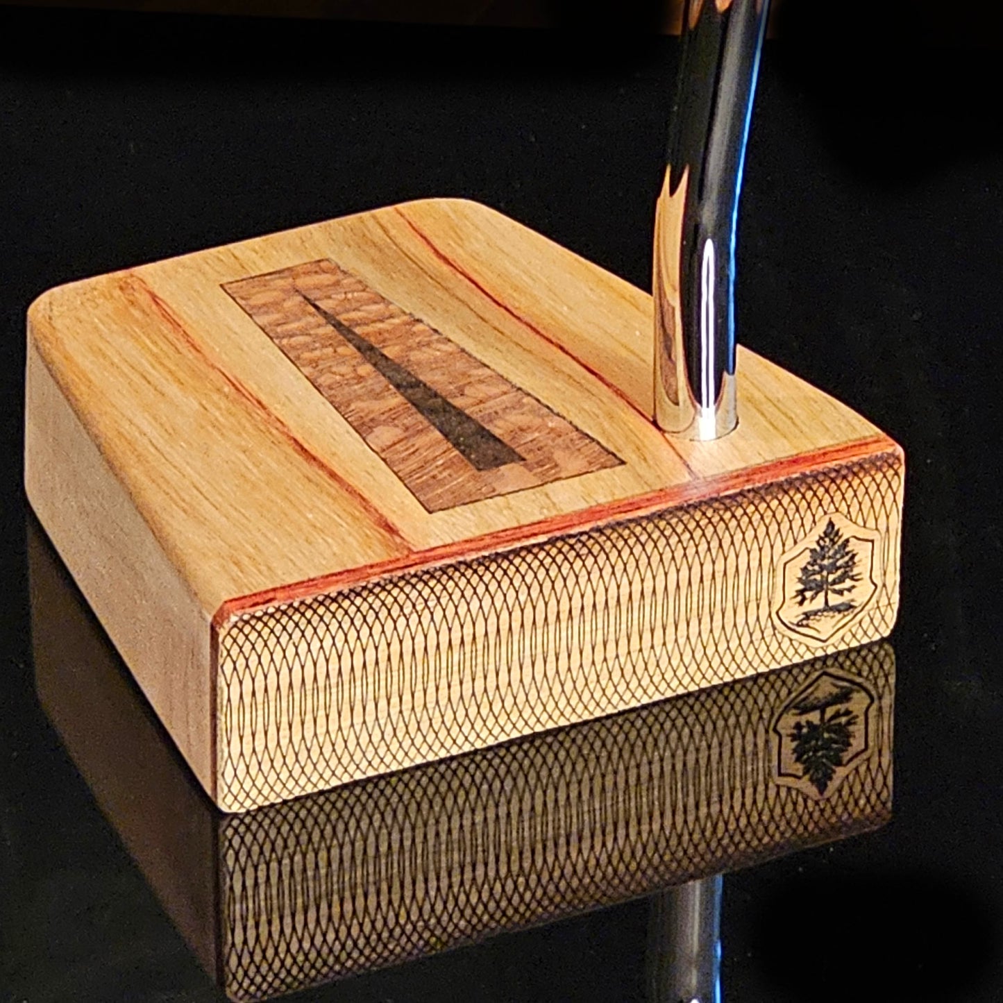 Canarywood top and faceplate putter with hard maple body and lacewood inlay