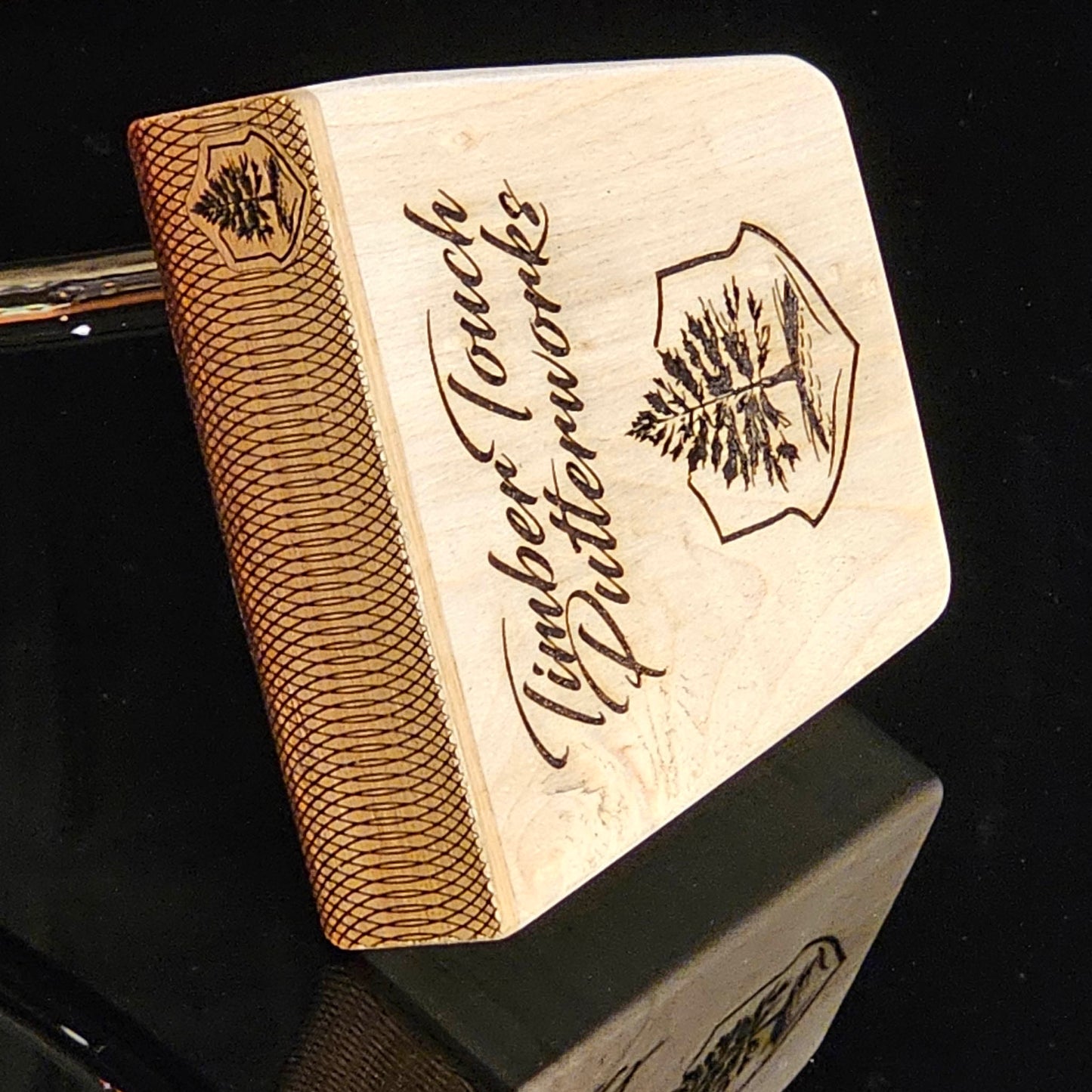 Canarywood top and faceplate putter with hard maple body and lacewood inlay