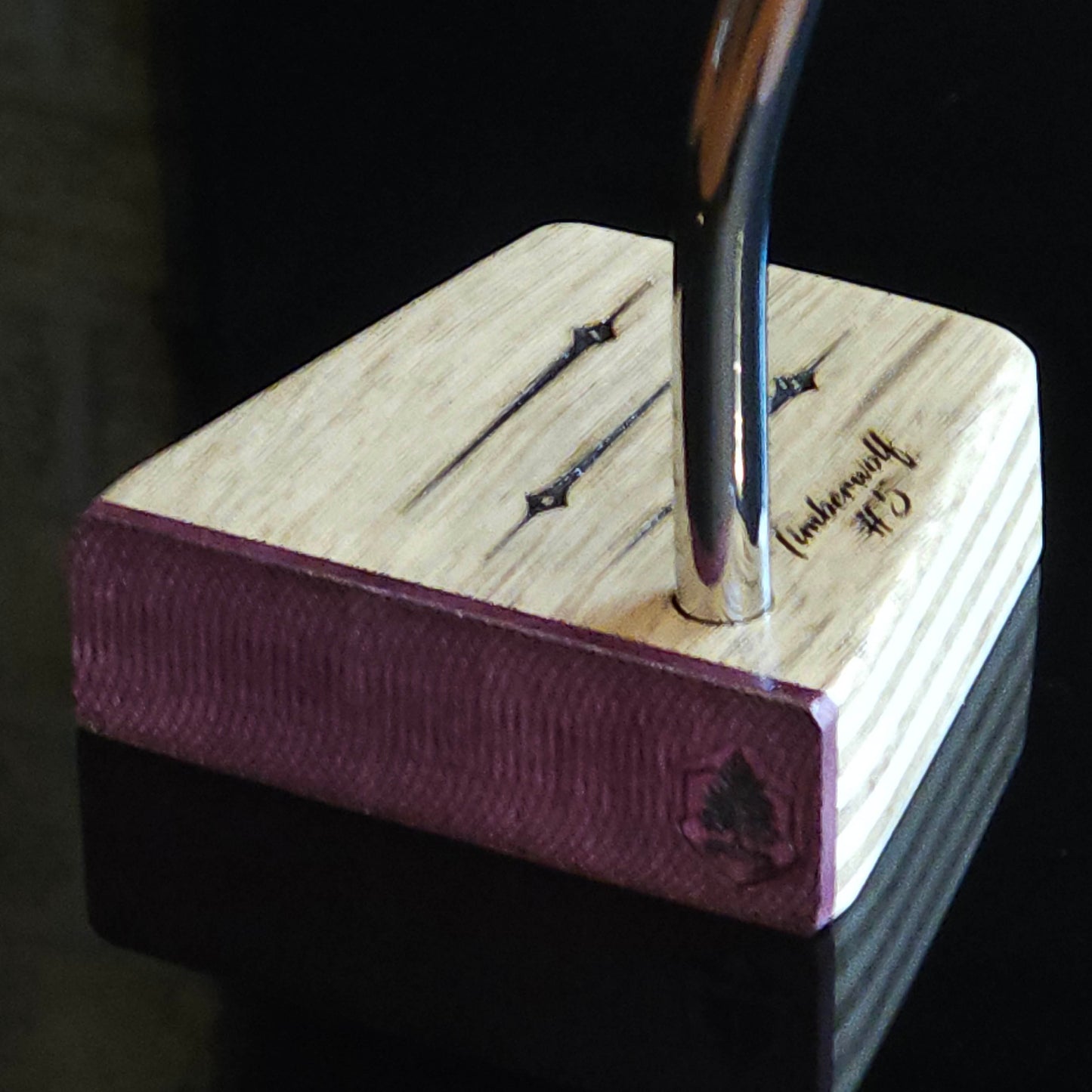 Black Limba wood and maple layered putter with purpleheart faceplate