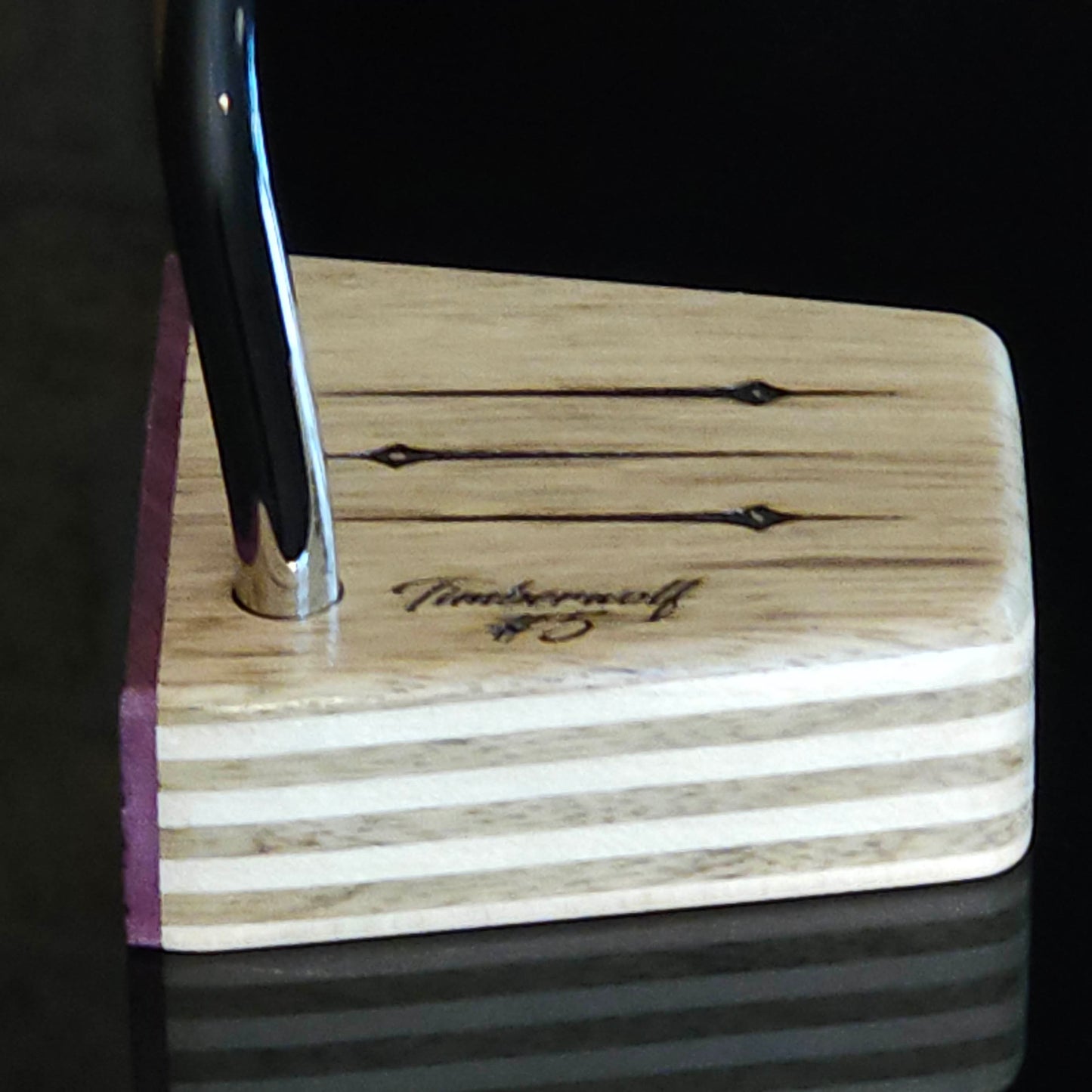 Black Limba wood and maple layered putter with purpleheart faceplate