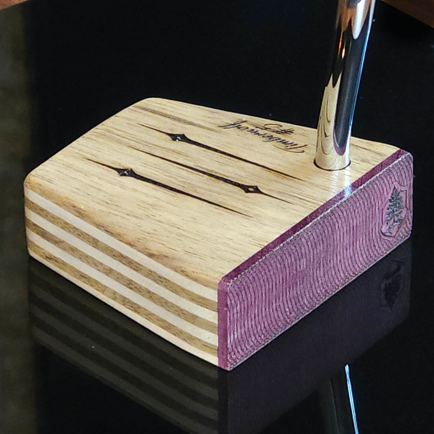 Black Limba wood and maple layered putter with purpleheart faceplate