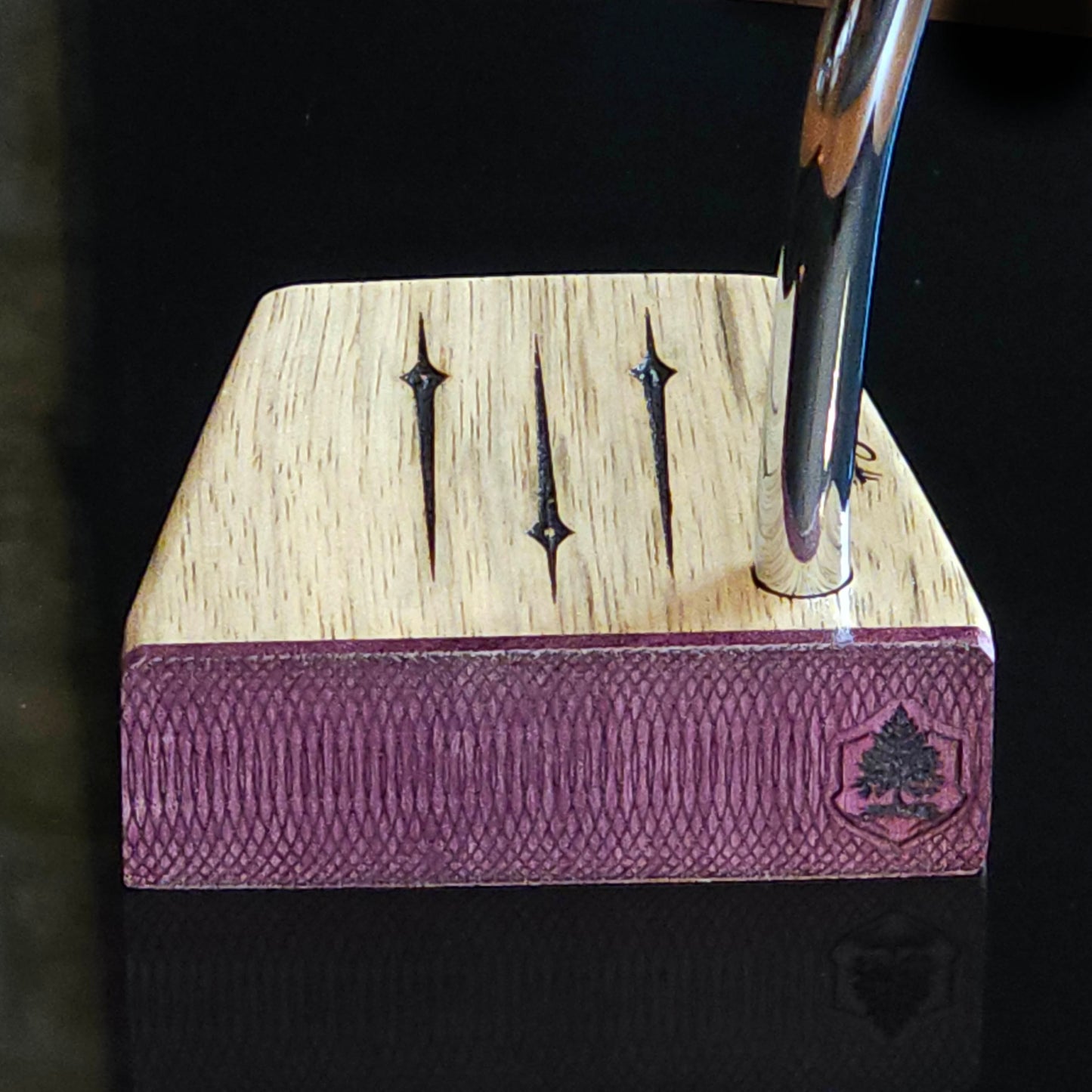 Black Limba wood and maple layered putter with purpleheart faceplate