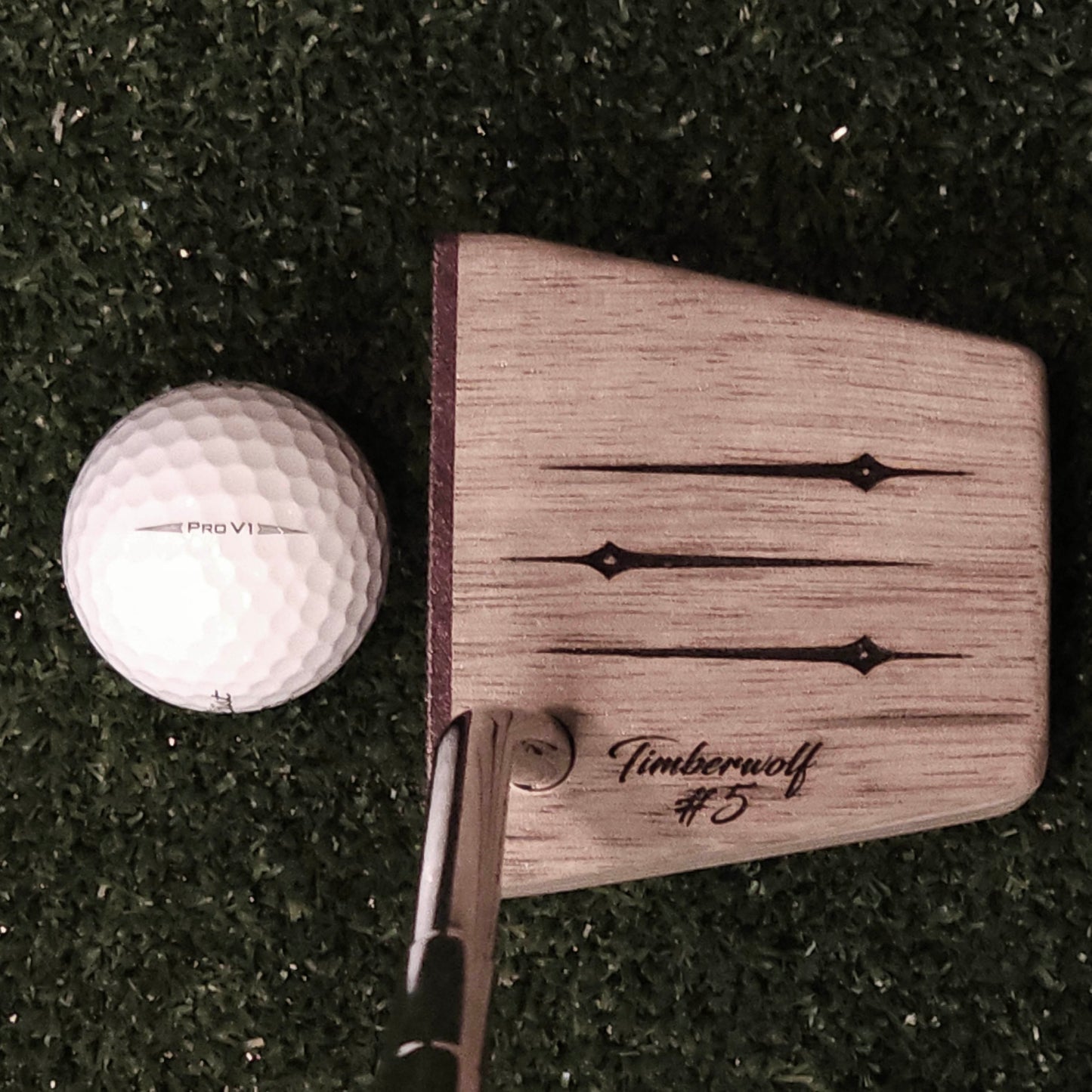 Black Limba wood and maple layered putter with purpleheart faceplate