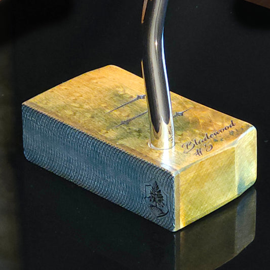 Hard Curly Oak body putter with Canarywood face and blue and yellow dye finish