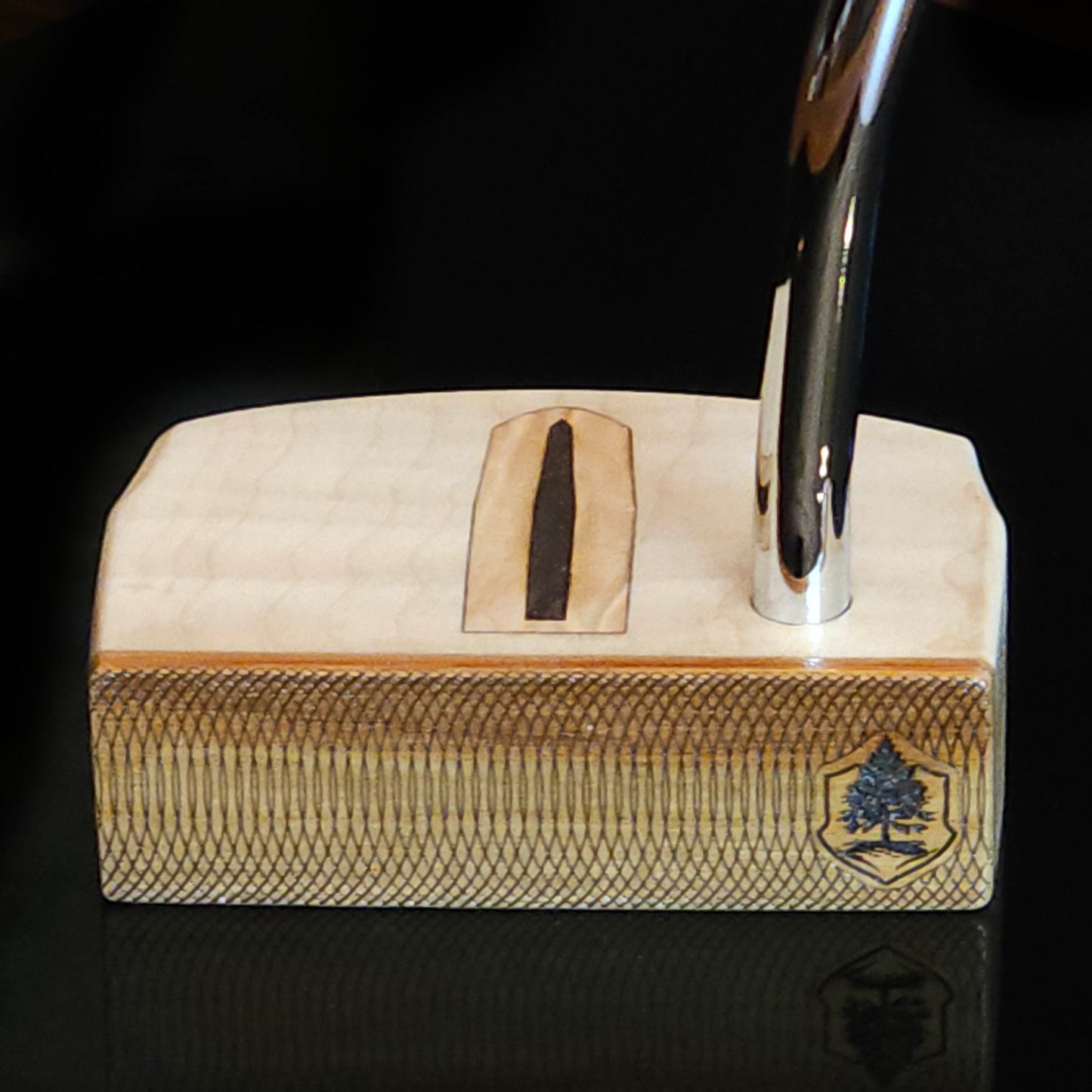 Curly Maple putter with canarywood faceplate and olivewood inlay