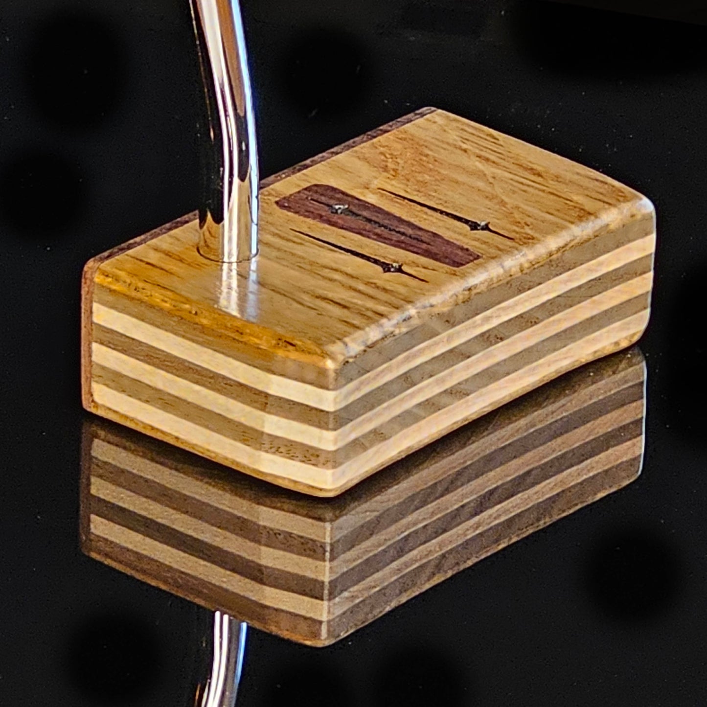 Teak, walnut and butternut layered putter with rare Bocote inlay and face