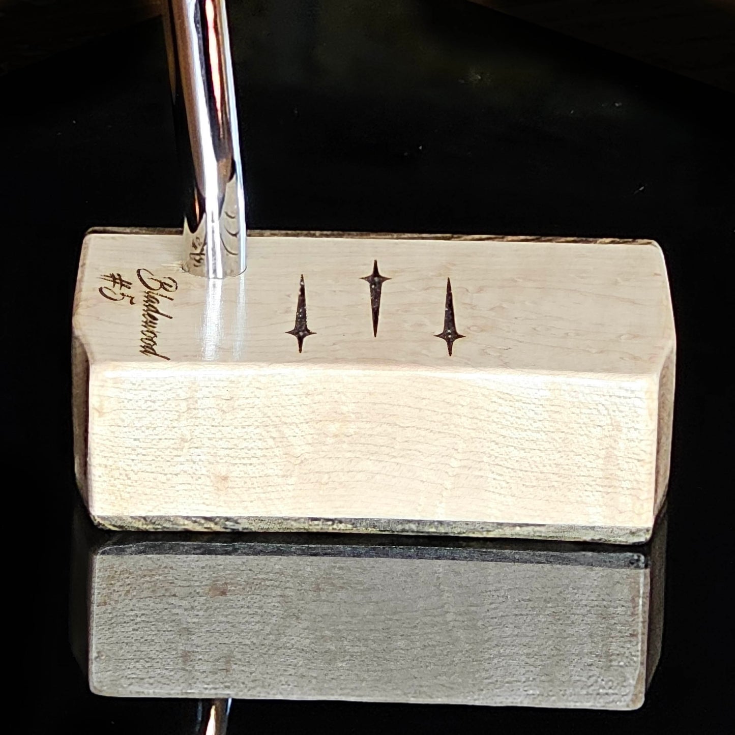 East Indian Rosewood and curly maple bladewood style putter