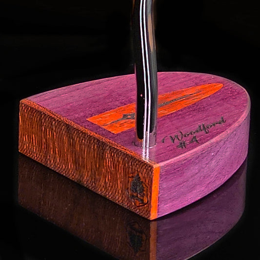 Purpleheart wood putter with Paduak wood inlay and faceplate