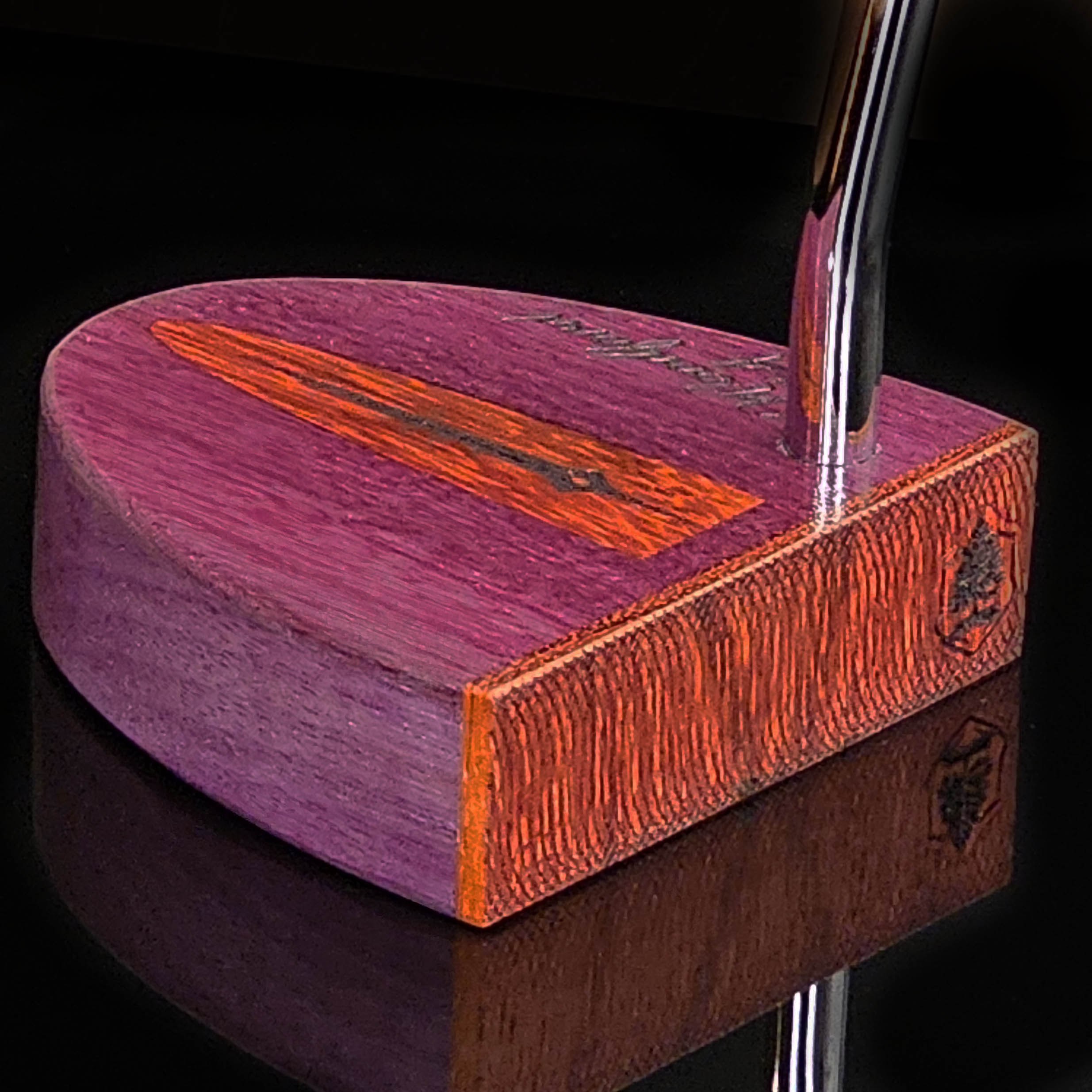 Purpleheart wood putter with Paduak wood inlay and faceplate