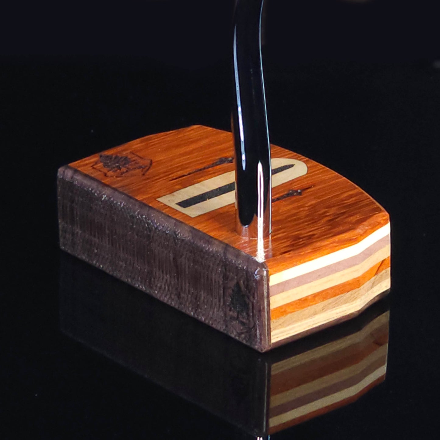 Paduak and Bubinga wood putter with many wood plied body, Olivewood inlay