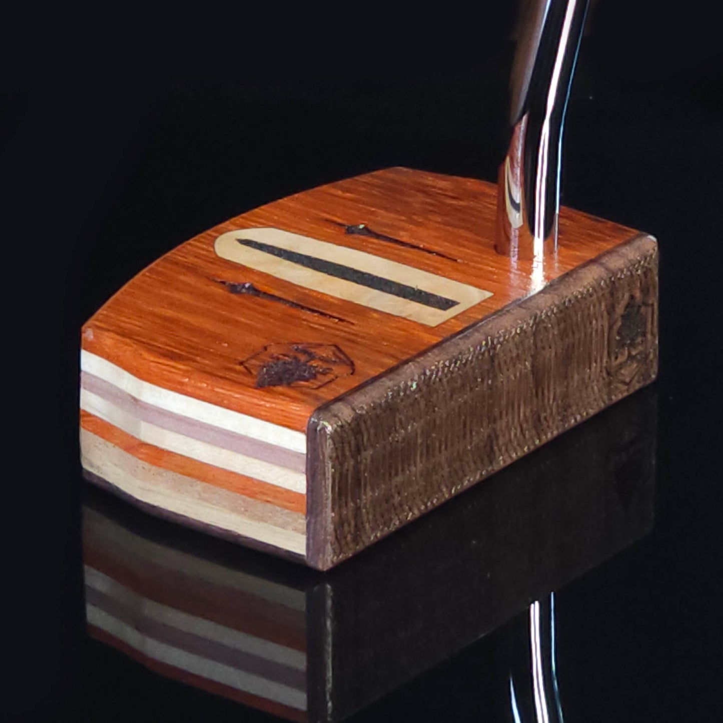 Paduak and Bubinga wood putter with many wood plied body, Olivewood inlay