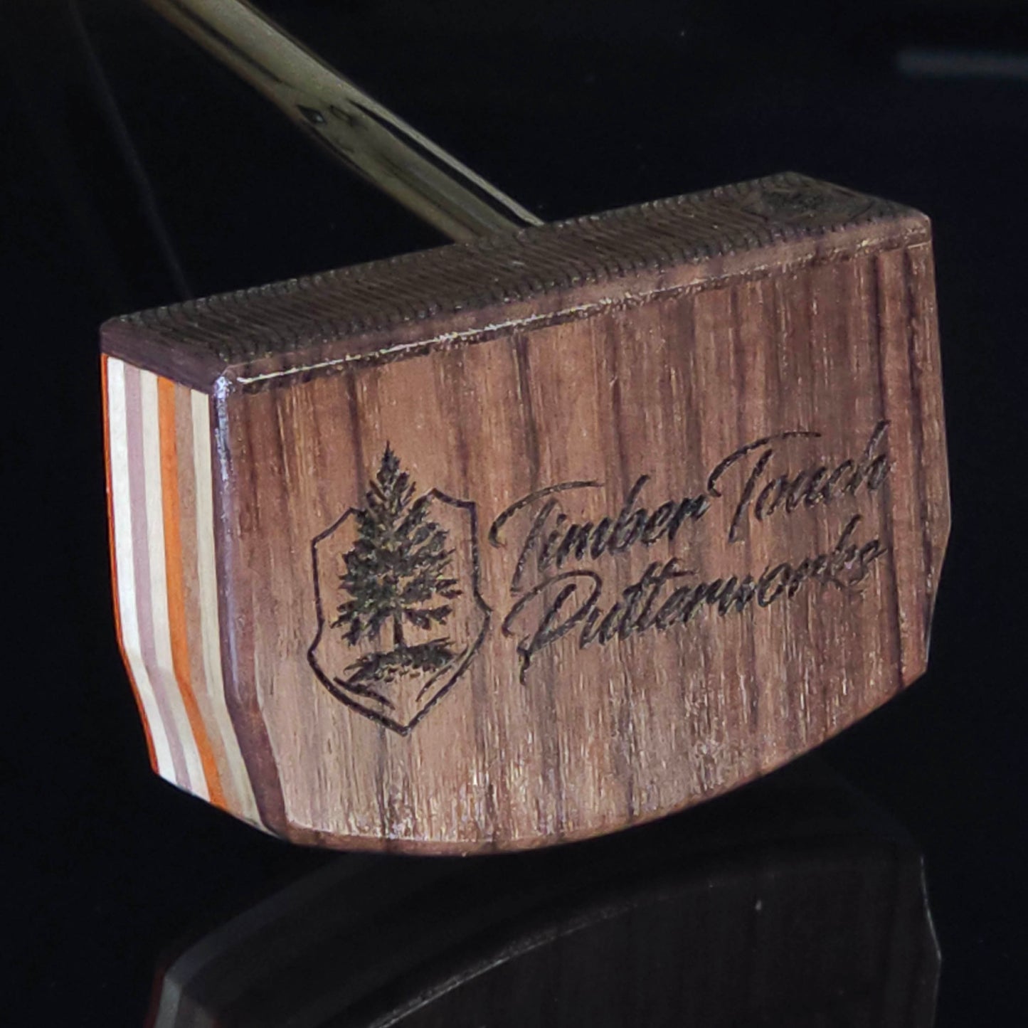 Paduak and Bubinga wood putter with many wood plied body, Olivewood inlay