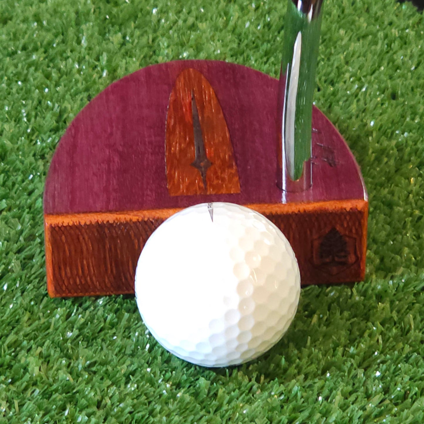 Purpleheart wood putter with Paduak wood inlay and faceplate