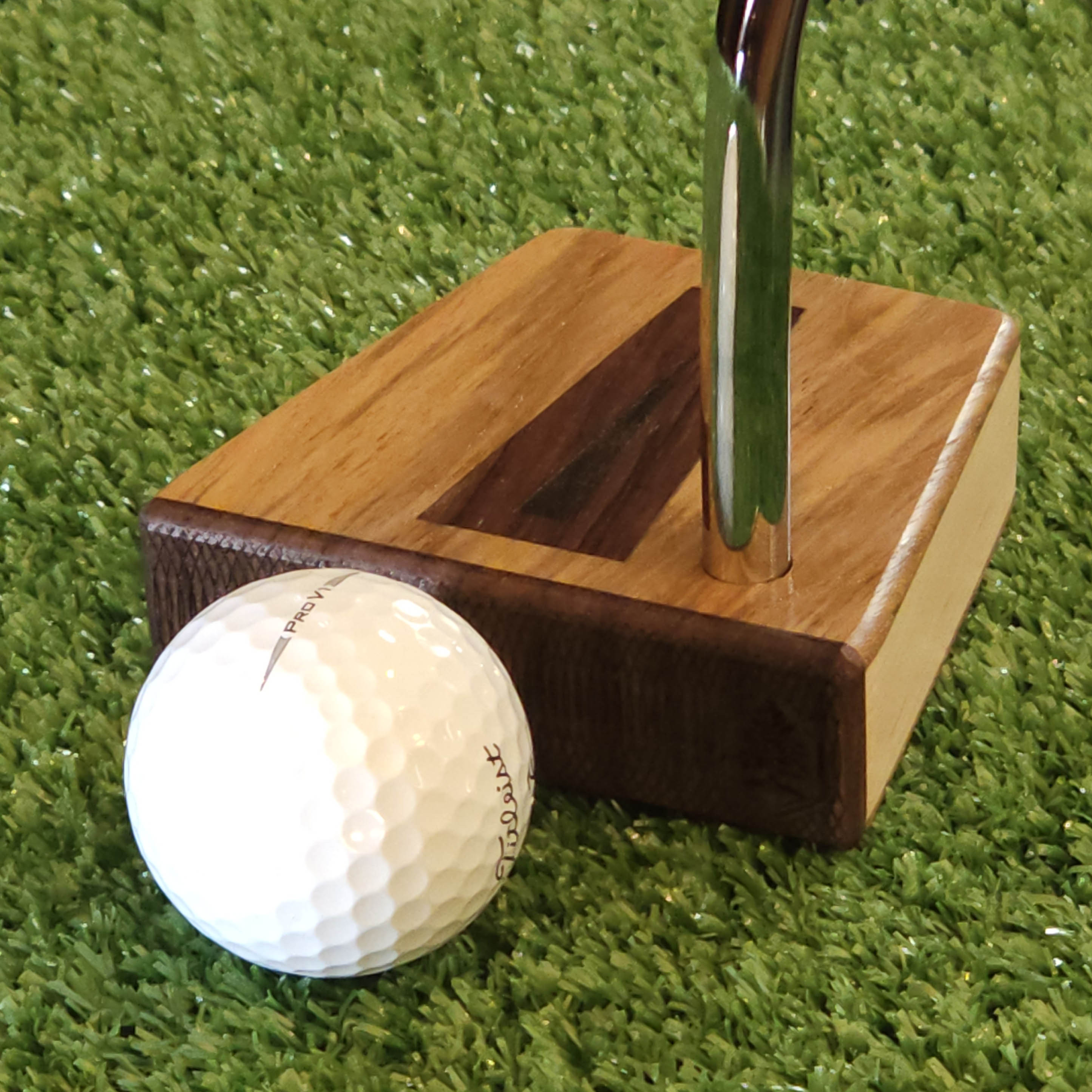 Teak putter with Hard Maple body  Bubinga faceplate and inlay - Timberwolf style