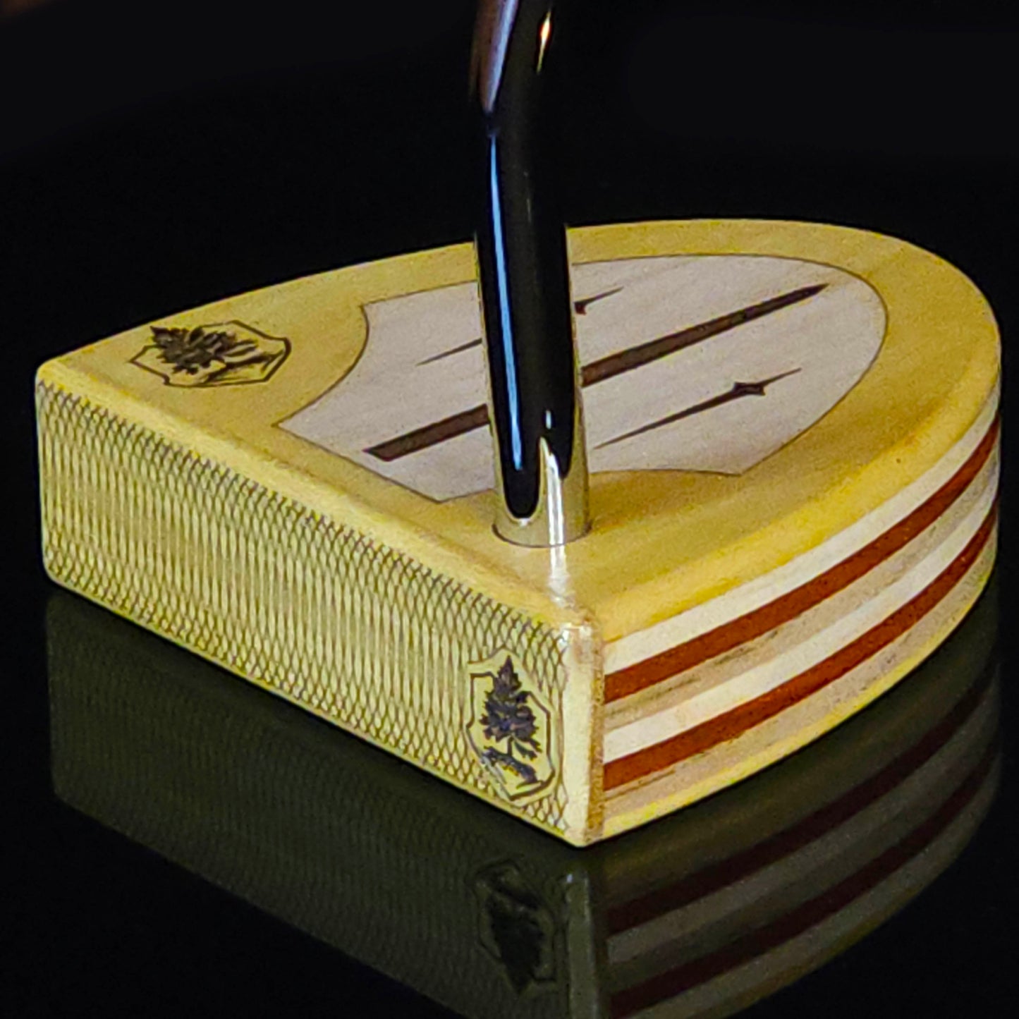 Yellowheart wood putter with various layered wood body