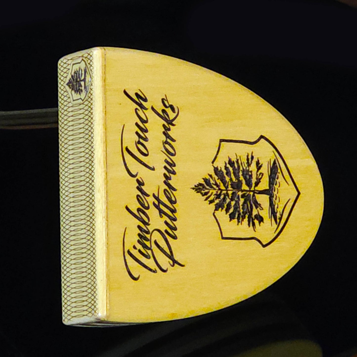 Yellowheart wood putter with various layered wood body