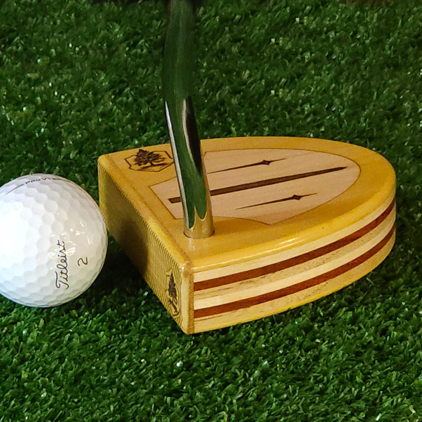 Yellowheart wood putter with various layered wood body