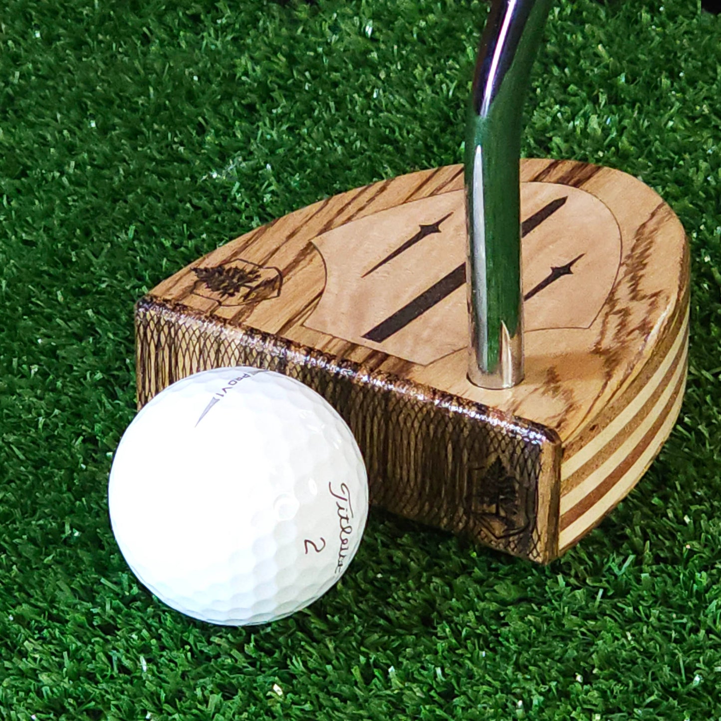 Zebrawood wood putter with various layered wood body and olivewood inlay