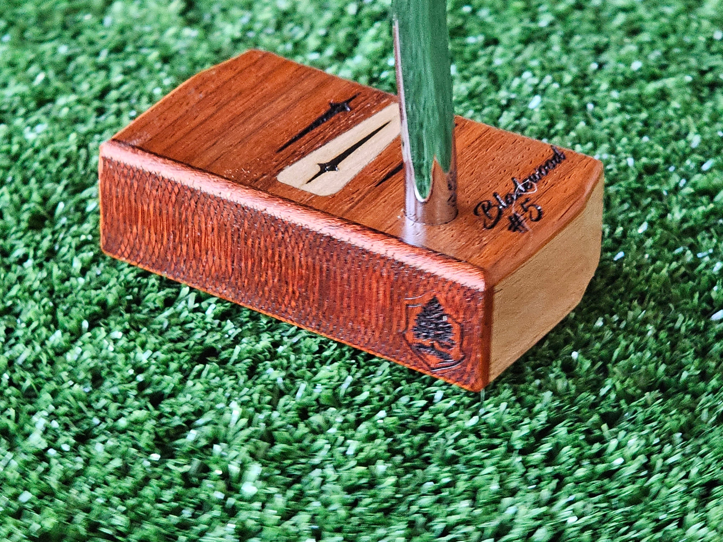 Bloodwood top and faceplate putter with Mahogany body.  Inlay design