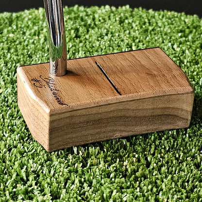 Walnut wood body putter with Purpleheart face.   Clean alignment line top view