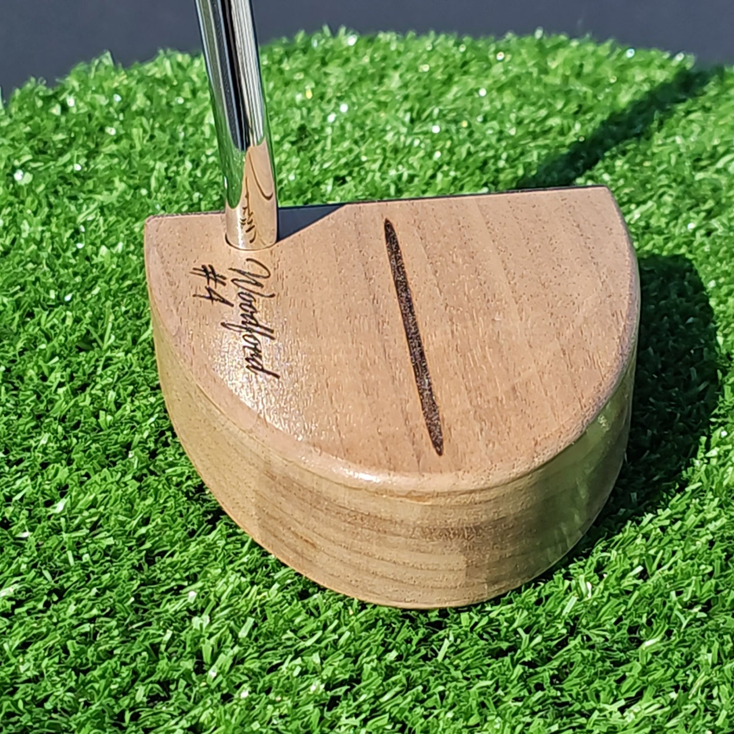 Walnut body putter with Purpleheart face plate