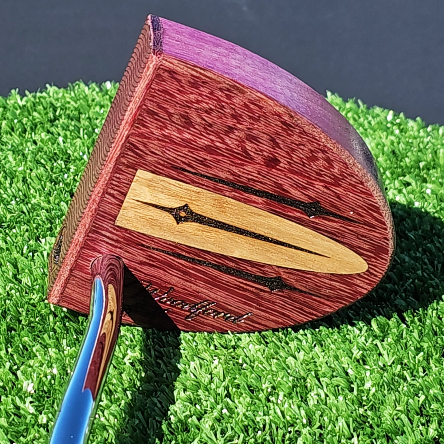 Purpleheart wood putter with Lacewood inlay