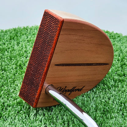 Curly Maple Body, Red Cedar top plate putter with Padauk Face plate