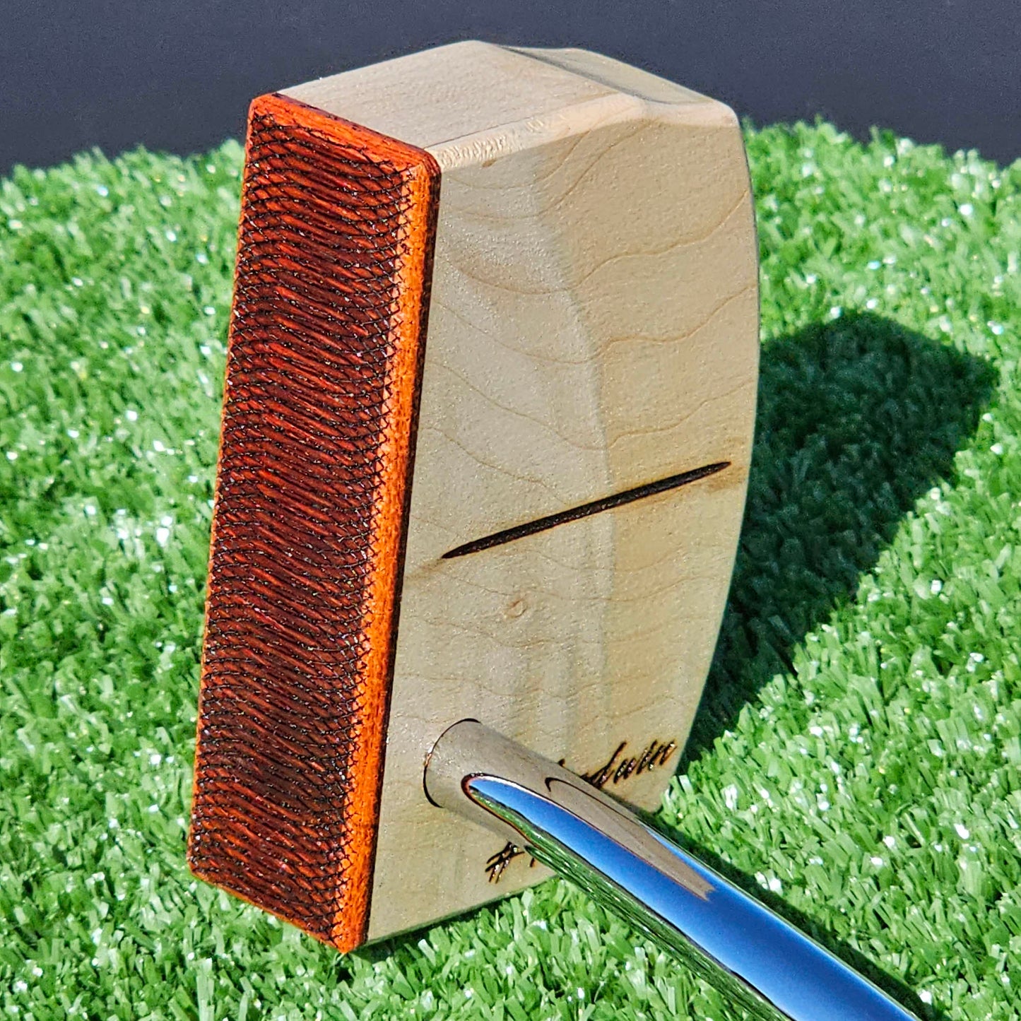 Curly Hard Maple putter with Red Padauk Face plate