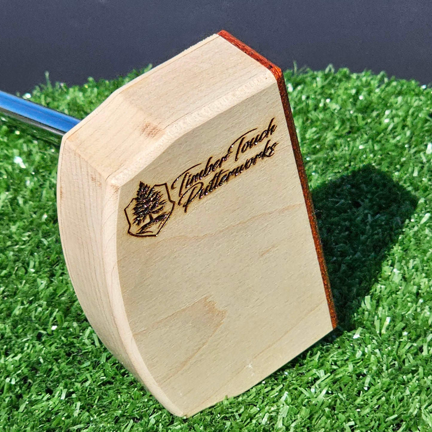 Curly Hard Maple putter with Red Padauk Face plate