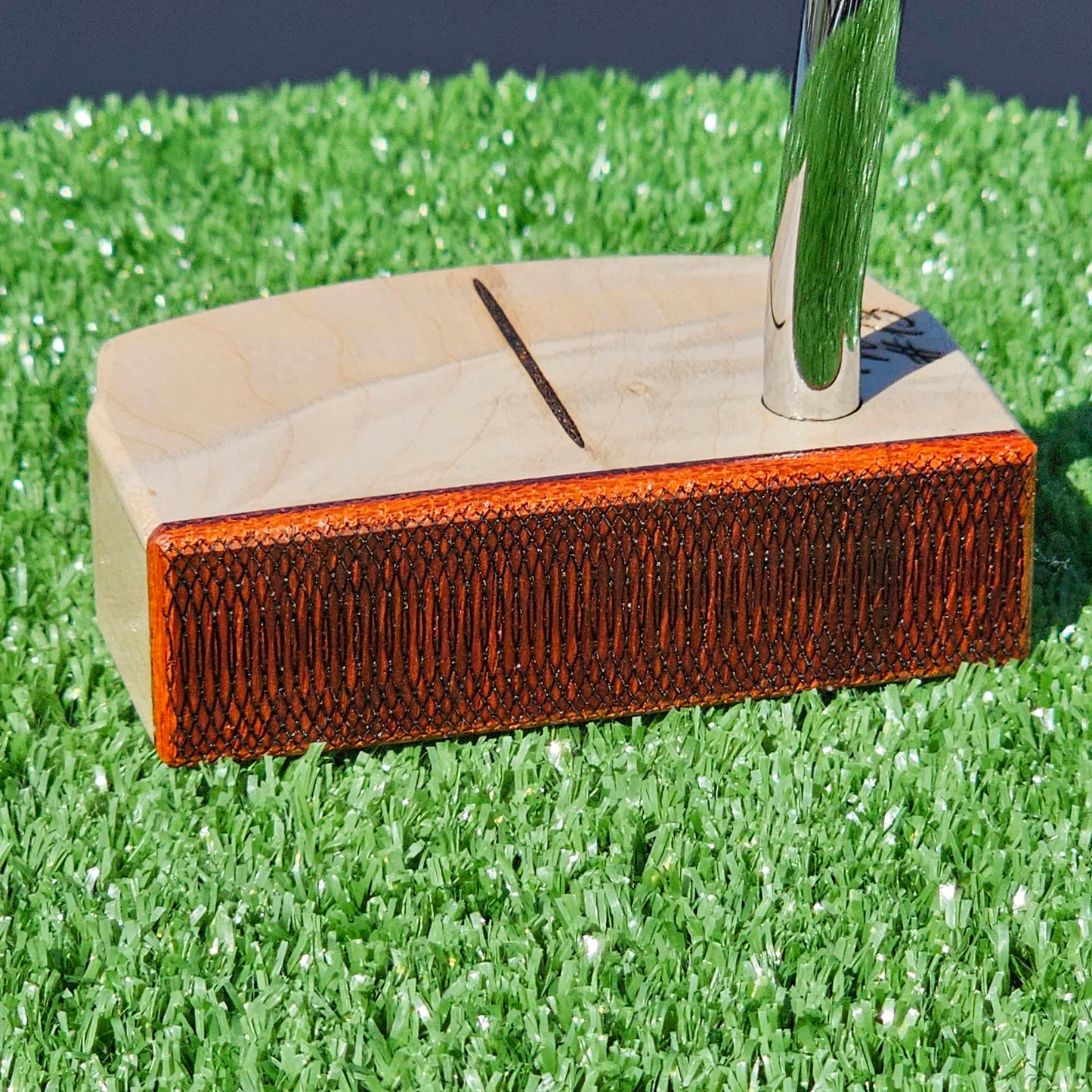 Curly Hard Maple putter with Red Padauk Face plate